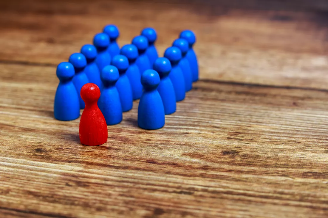 high-angle-view-multi-colored-tokens-wooden-table